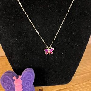 Crystal purple/pink butterfly on a gold tone chain in butterfly box